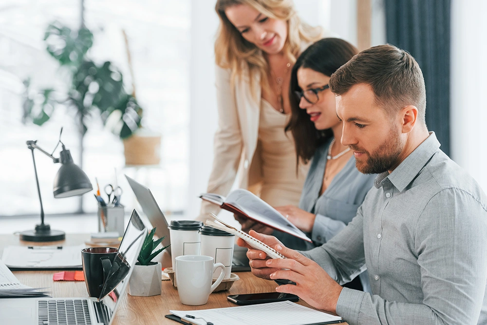 sitting-by-the-table-group-of-business-people